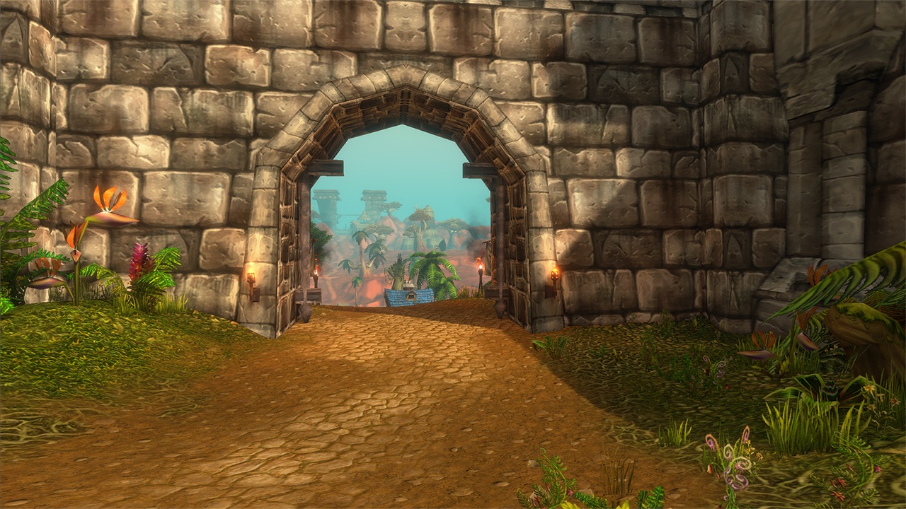 In-game screenshot: a cobbled road leading through an arched gateway in a high grey stone wall, with palm trees and ruins visible beyond